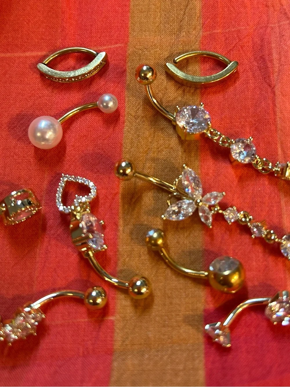 Bundle of 10 assorted gold Tone and Pearl belly button rings